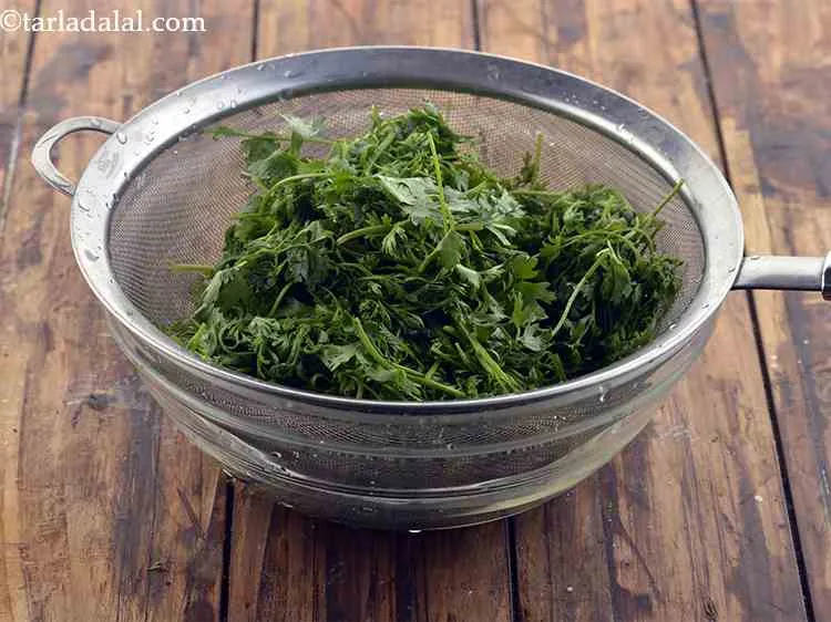 Step 19 – Rinse the coriander leaves in water to remove any dirt/mud that might be stuck to …