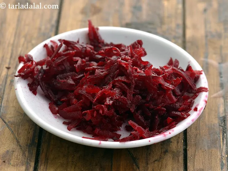 Step 16 – Grate the beetroot using a grater. Keep the grated beetroot aside.