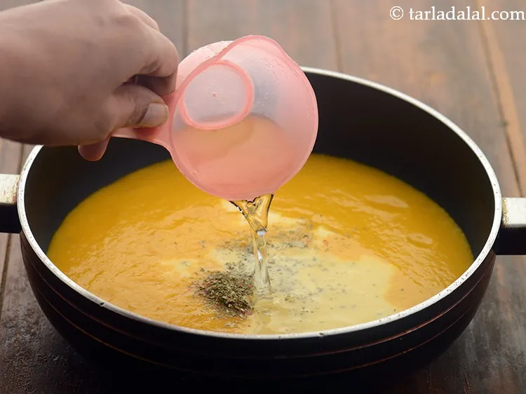 Step 21 – Add milk and &frac12; cup of water to adjust the consistency of the soup.