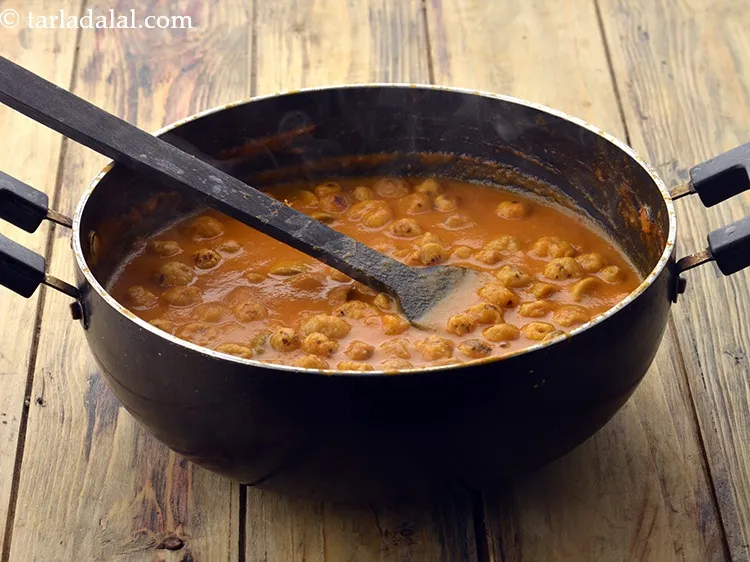 Step 44 – Mix well and cook on a medium flame for 7 minutes, while stirring occasionally.