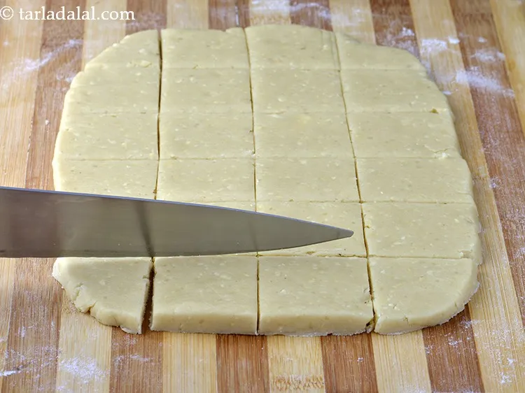 Step 33 – Cut the rolled dough into 50 mm. X 50 mm. (2&rdquo; x 2&rdquo;) equal square …