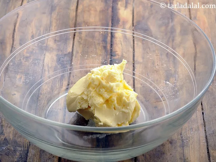 Step 24 – In another deep bowl, add 5 tbsp&nbsp;<a href="https://www.tarladalal.com/glossary-soft-butter-naram-makhan-1942i">soft butter</a>.