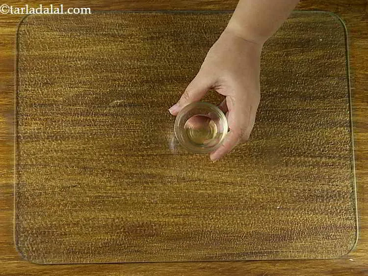 Step 1 – To make the <strong>Praline (Cashew Praline) </strong>for the <a href="https://www.tarladalal.com/Butterscotch-Ice-Cream-3980r">Butterscotch ice cream</a>, first grease a …