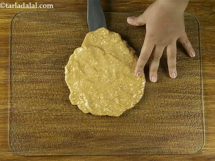 Step 8 – Scrape the&nbsp;<strong>Praline (Cashew Praline)</strong>&nbsp;out using a palate knife. A palate knife is flat and broad, …