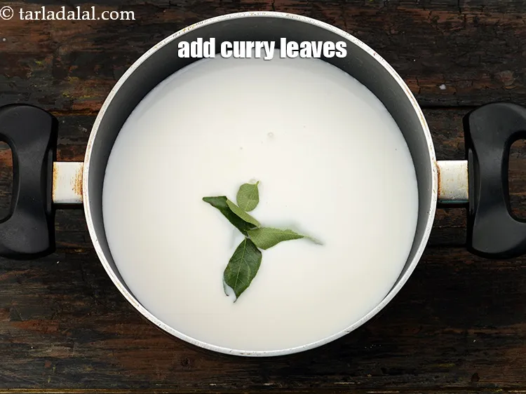 Step 19 – Add 4 to 5&nbsp;<a href="https://www.tarladalal.com/glossary-curry-leaves-kadi-patta-kadipatta-388i">curry leaves (kadi patta)</a>.&nbsp;