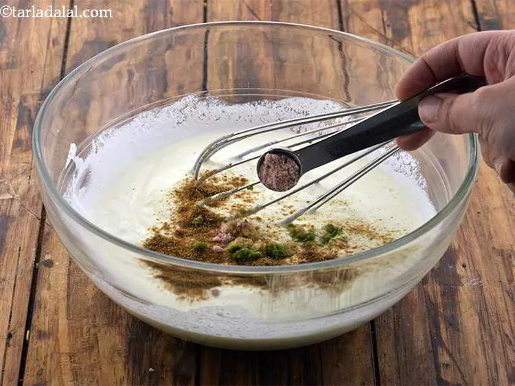 Step 4 – Add the black salt and salt in the deep bowl. You can skip the sanchal …