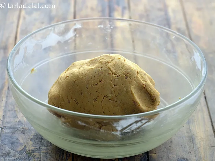 Step 13 – Mix well and knead into a soft dough. Taste the dough for seasoning and increase …