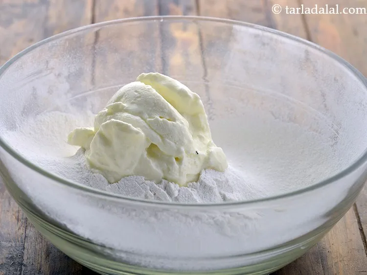 Step 4 – Add &frac12; cup of curd. We have used <a href="https://www.tarladalal.com/Basic-Homemade-Curd-Dahi-Or-Yogurt-Using-Cows-Milk-42457r">homemade curd</a>&nbsp;which will help in making …
