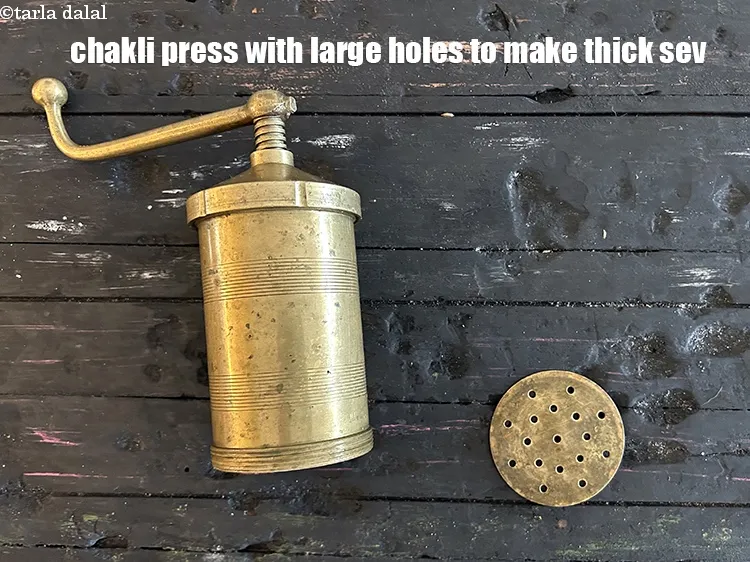 Step 3 – Chakli press with large holes to make the thick sev.