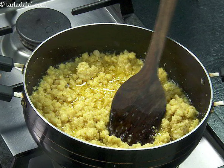 Step 10 – Mix well to combine the ghee and dal very well.