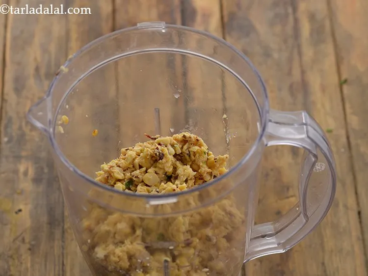 Step 11 – Blend the chana dal to a thick coarse paste. If required, once in between you …