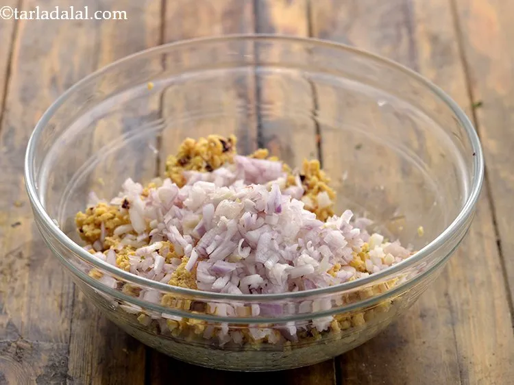 Step 13 – Add all the remaining ingredients starting with finely chopped onions. If you are Jain, then …