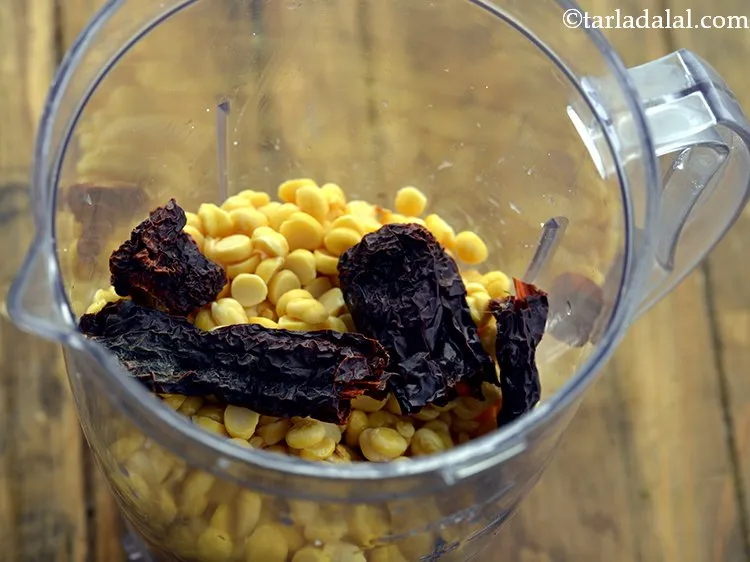 Step 8 – Add kashmiri red chillies. We have removed the stem and roughly broken it into two …