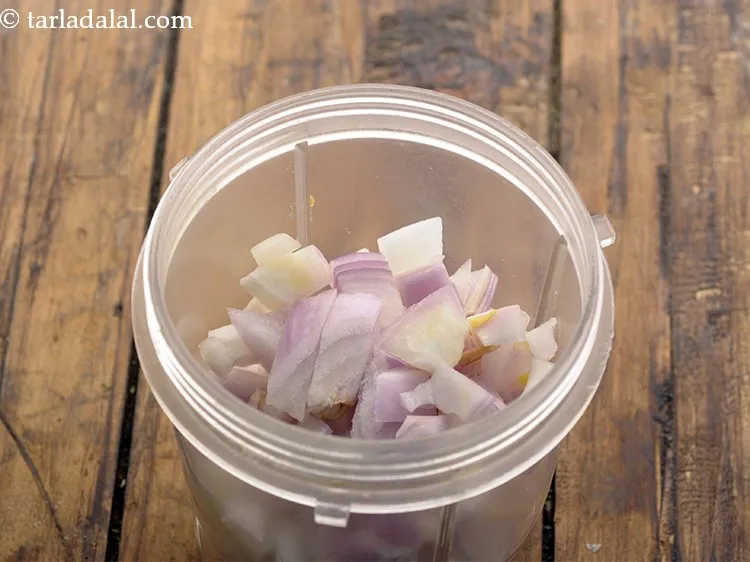 Step 2 – For <strong>palak chole</strong>, we will also require an onion paste. In a big mixer jar, …