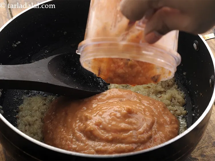 Step 17 – Add the prepared brinjal-tomato pur&eacute;e.