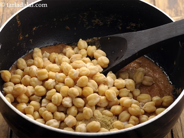 Step 23 – Add salt and kabuli chana.