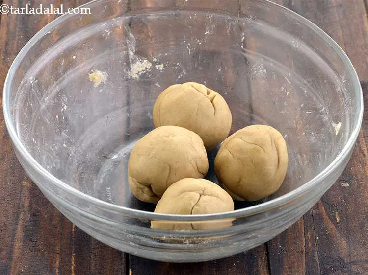 Step 10 – Your next step is to divide the dough into 4 equal portions.