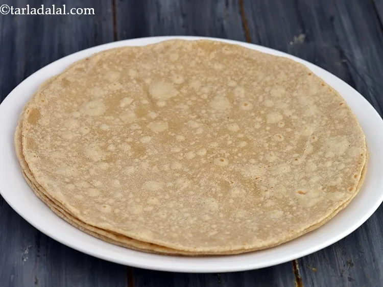 Step 16 – Flip and again cook the chapati for Paneer Veggie Wrap for 5 to 7 seconds. …