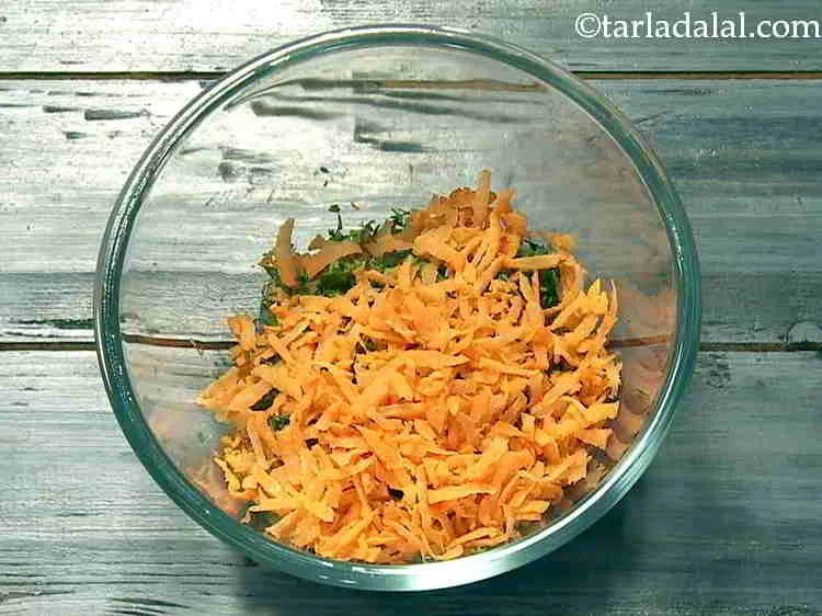 Step 8 – Now add grated carrot. Skip adding vegetables that you dislike or are not available.
