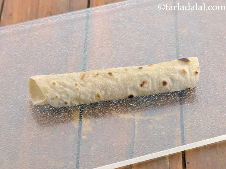 Step 18 – Roll it up tightly. Repeat steps 2 and 3 to make 7 more rolls.