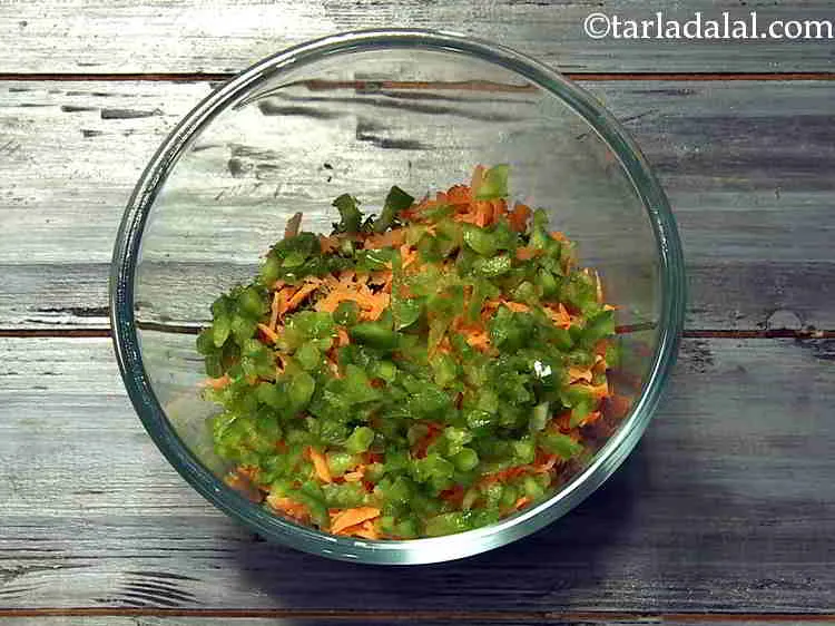 Step 9 – Add finely chopped capsicum. You can also use red and yellow bell pepper.