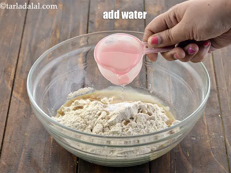 Step 13 – Then add water, taking care to add water little by little as required or else …