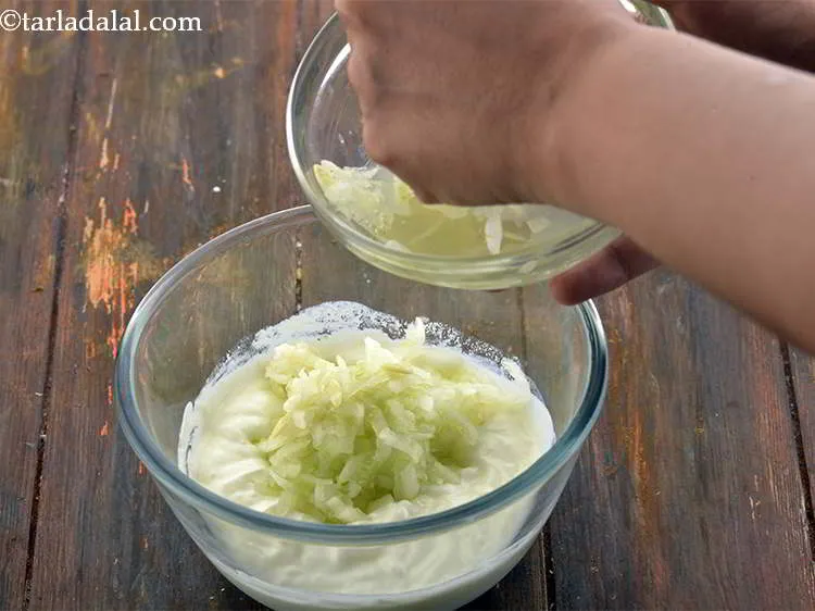 Step 26 – Add 1/2 cup&nbsp;<a href="https://www.tarladalal.com/glossary-grated-cucumber-1058i">grated cucumber</a>.