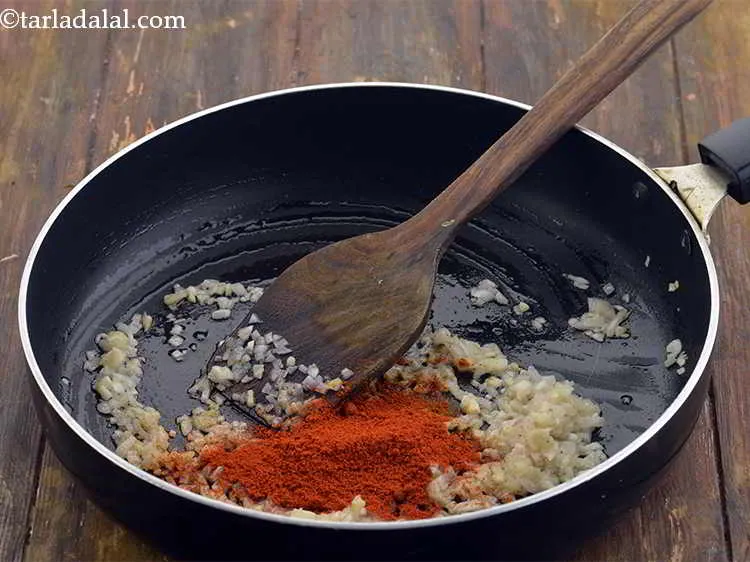 Step 15 – Add 2 tsp&nbsp;<a href="https://www.tarladalal.com/glossary-chilli-powder-red-chilli-powder-339i">chilli powder</a>.&nbsp;