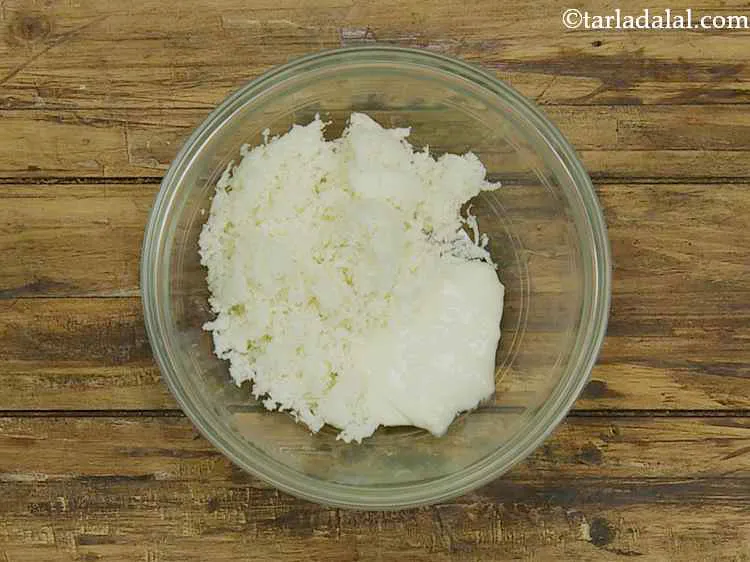 Step 2 – To this, add the grated mozzarella cheese. The reason for adding 2 types of cheeses …