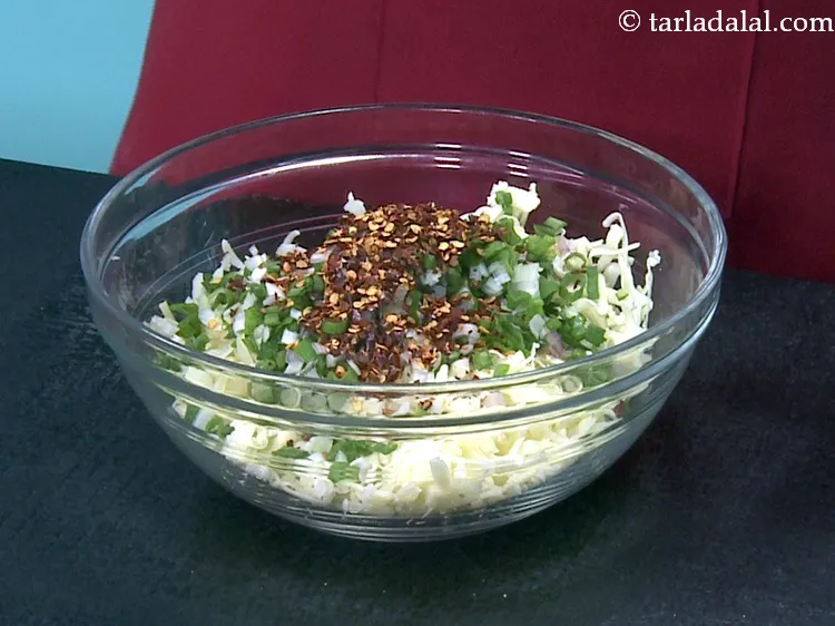 Step 28 – Add 4 tsp&nbsp;<a href="https://www.tarladalal.com/glossary-dry-red-chilli-flakes-paprika-338i">dry red chilli flakes</a>. These can be replaced with finely chopped green …