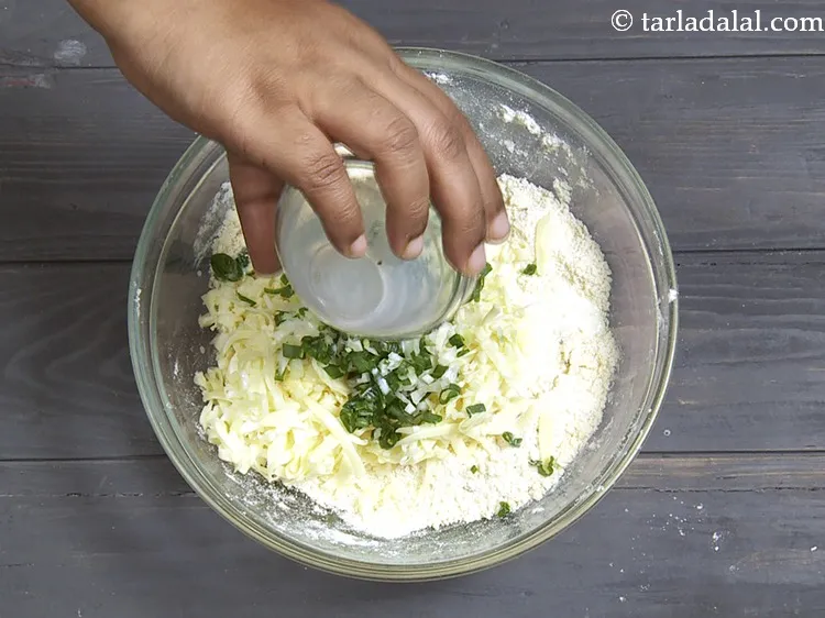 Step 22 – Add 1 tbsp&nbsp;<a href="https://www.tarladalal.com/glossary-milk-doodh-full-fat-milk-buffalo-milk-full-cream-milk-514i">milk</a>.