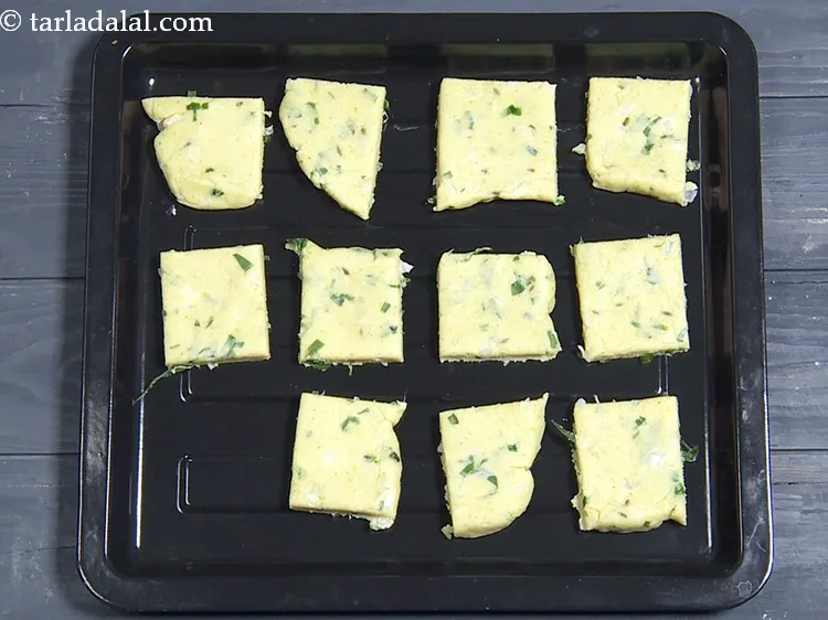 Step 31 – Place them on a baking tray and bake in a pre-heated oven at 180&deg;c (360&deg;f) …