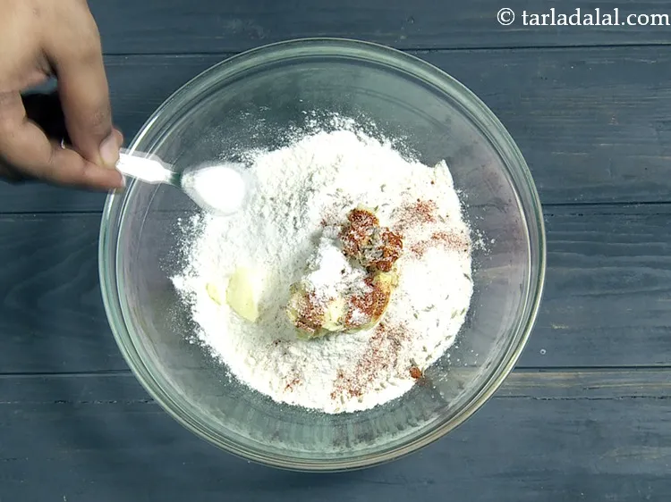 Step 18 – Add <a href="https://www.tarladalal.com/glossary-salt-namak-table-salt-418i">salt</a>&nbsp;to taste.