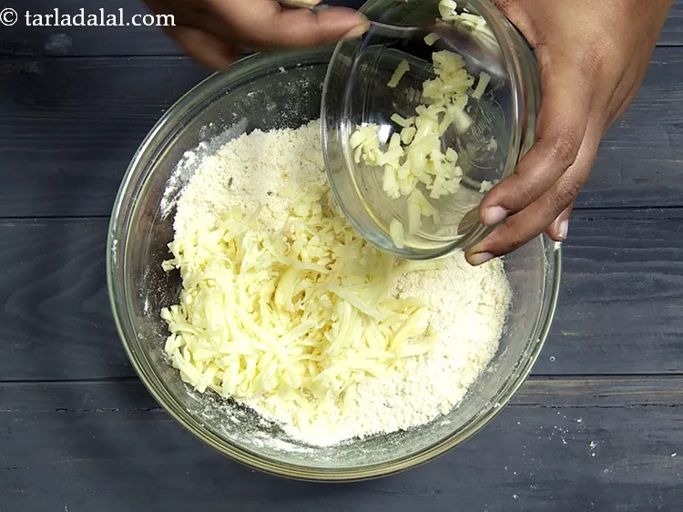 Step 20 – Add 3/4 cup&nbsp;<a href="https://www.tarladalal.com/glossary-grated-processed-cheese-868i">grated processed cheese</a>. Grate the cheese just before adding, else it might …