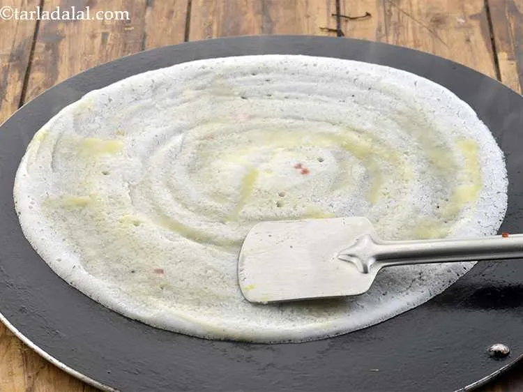 Step 41 – Spread it evenly using a flat ladle.&nbsp;