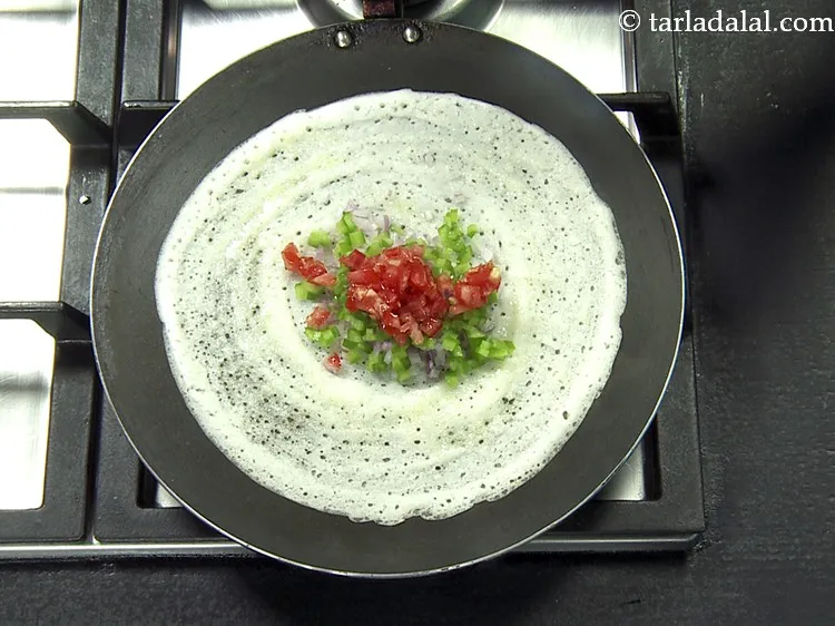 Step 45 – Put 1 tbsp of finely&nbsp;<a href="https://www.tarladalal.com/glossary-chopped-tomatoes-779i">chopped tomatoes</a>.