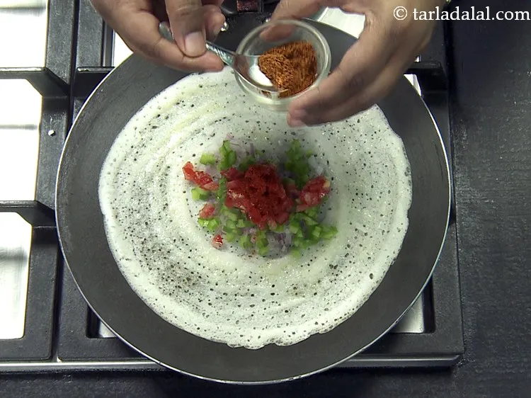 Step 47 – Put &frac14; tsp of <a href="https://www.tarladalal.com/glossary-pav-bhaji-masala-298i">pav bhaji masala</a>.