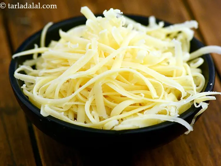Step 3 – Then we need 1 1/2 cups&nbsp;<a href="https://www.tarladalal.com/glossary-grated-processed-cheese-868i">grated processed cheese</a>. Grate and keep it ready.&nbsp;