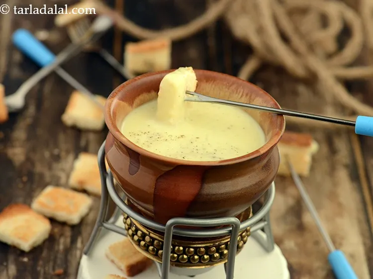 Step 13 – Serve&nbsp;<strong>cheese fondue | Indian style cheese fondue | quick cheese fondue &nbsp;without wine |</strong>&nbsp;immediately with …