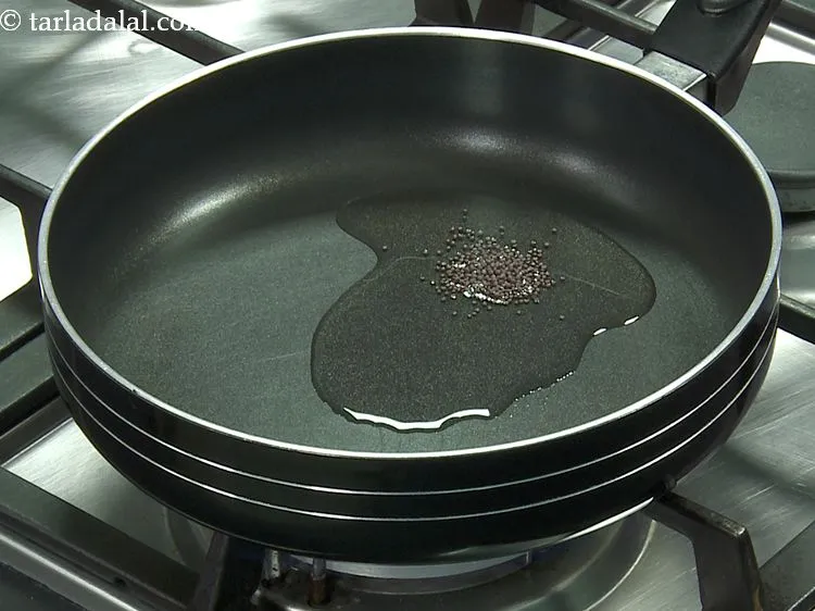 Step 3 – Add the mustard seeds.&nbsp;