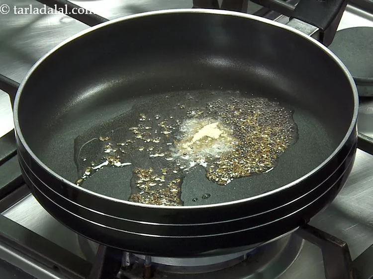 Step 6 – Add the asafoetida.&nbsp;