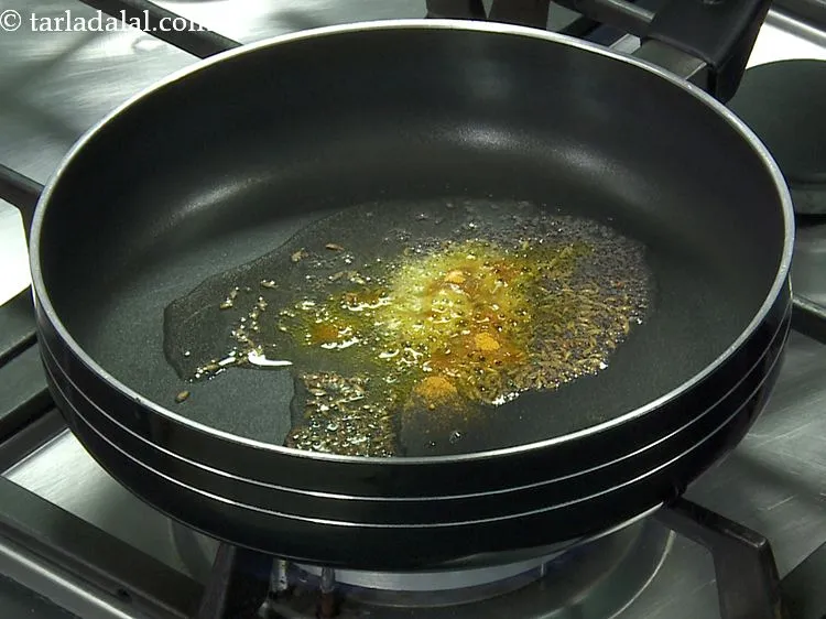 Step 7 – Add the turmeric powder. Adding haldi to oil before adding the veggies help cook turmeric …