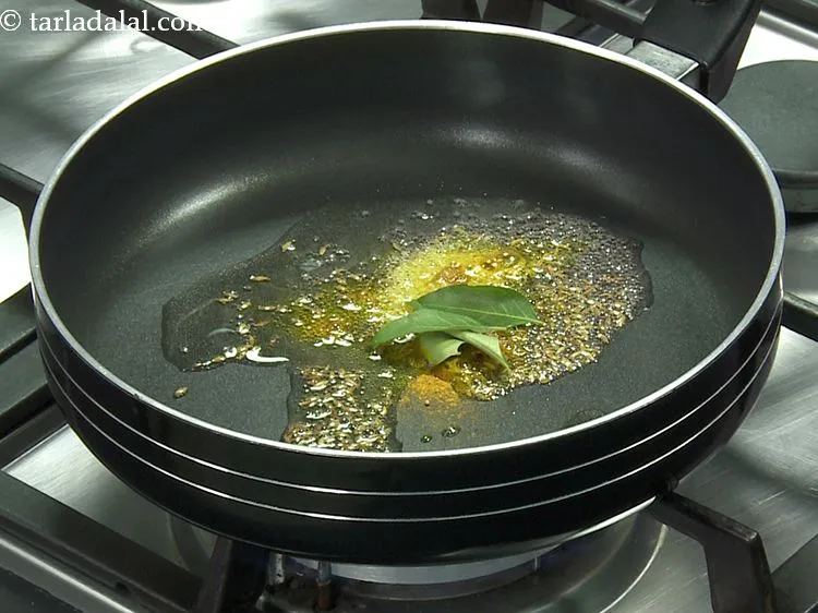 Step 8 – Add a few curry leaves. If you wish you can avoid them.&nbsp;