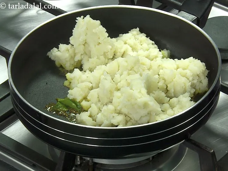 Step 10 – Add the boiled and mashed potatoes. You can cook the potatoes in a pressure cooker, …