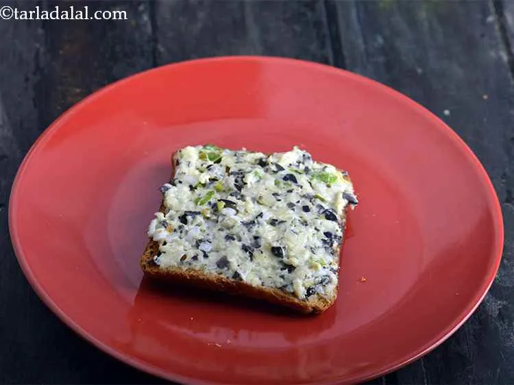 Step 11 – Turn over the bread slices and spread little mixture evenly over each slice.