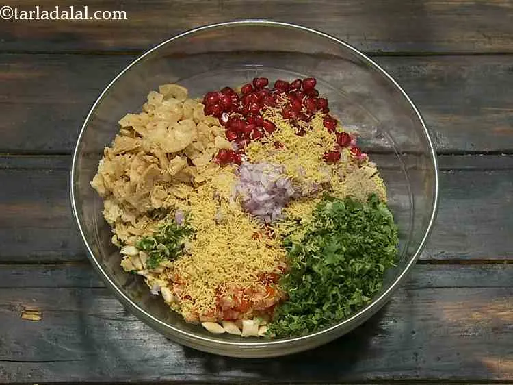 Step 9 – Finally, add sev. An addition of grated cheese also, makes the bhel more tempting!