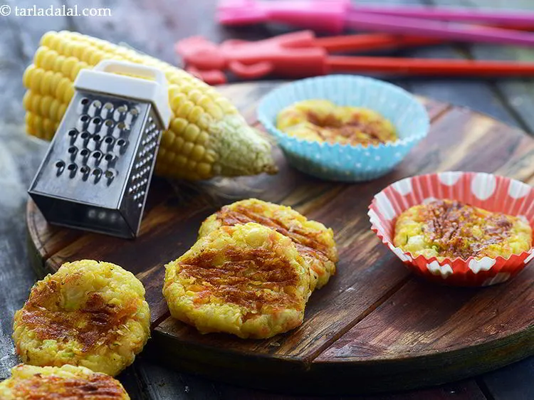 Step 23 – Serve the <strong>cheesy corn and vegetable cutlets</strong> immediately to your little one.