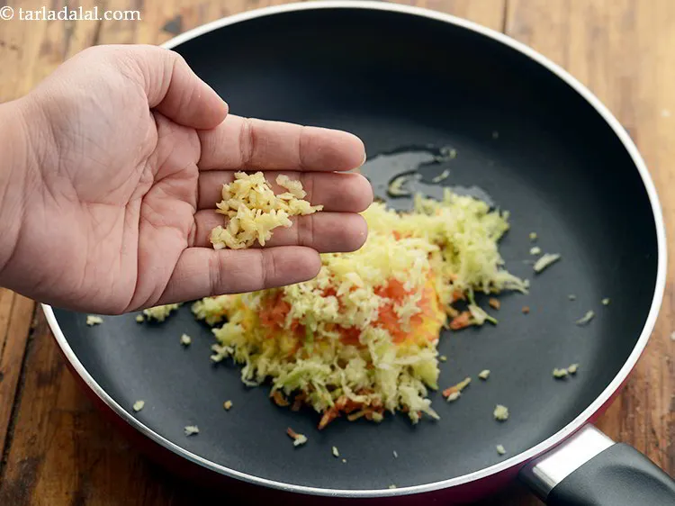 Step 12 – Add some grated garlic to it. You can add garlic paste also if you wish …