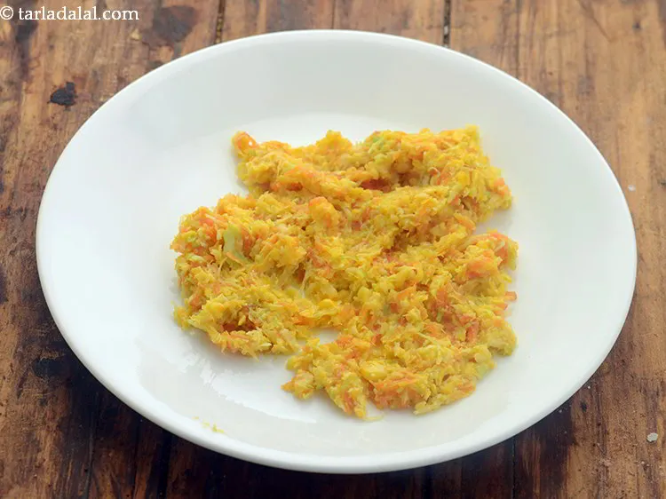 Step 14 – Remove from the flame and transfer the ingredients of vegetable cheese cutlets into a plate …