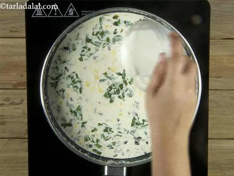 Step 11 – Add the cornflour-milk mixture, mix well and cook on a medium flame for 1 minute, …